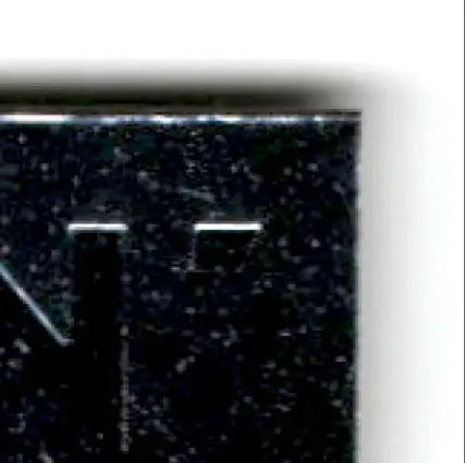 Dark speckled rectangular object with cutouts from Upper Deck Racing Road to the Cup Rick Mast