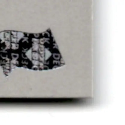 Torn reflective security label on light-colored package for 1996 Upper Deck Racing Road to the Cup Steve Grissom RC25a