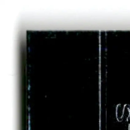 Dark glossy section of 1996 Upper Deck Racing Road to the Cup Steve Grissom RC25a card with scratch and dust