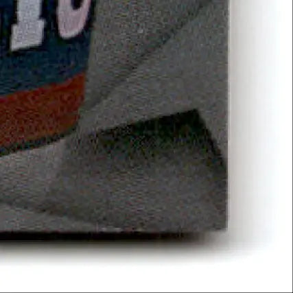 Corner of flexible gray textured material with red and blue stripe from Wheels Racing Viper Ken Schrader #61