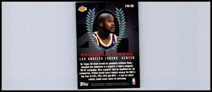 Shaquille O’Neal trading card from 1997-98 Topps collection displayed prominently