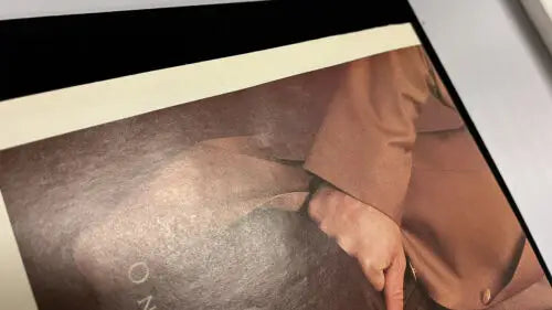 Tan suit jacket from the 1997 Craig Biggio Signed Astros Houston Newspaper Lucho Insert Auto