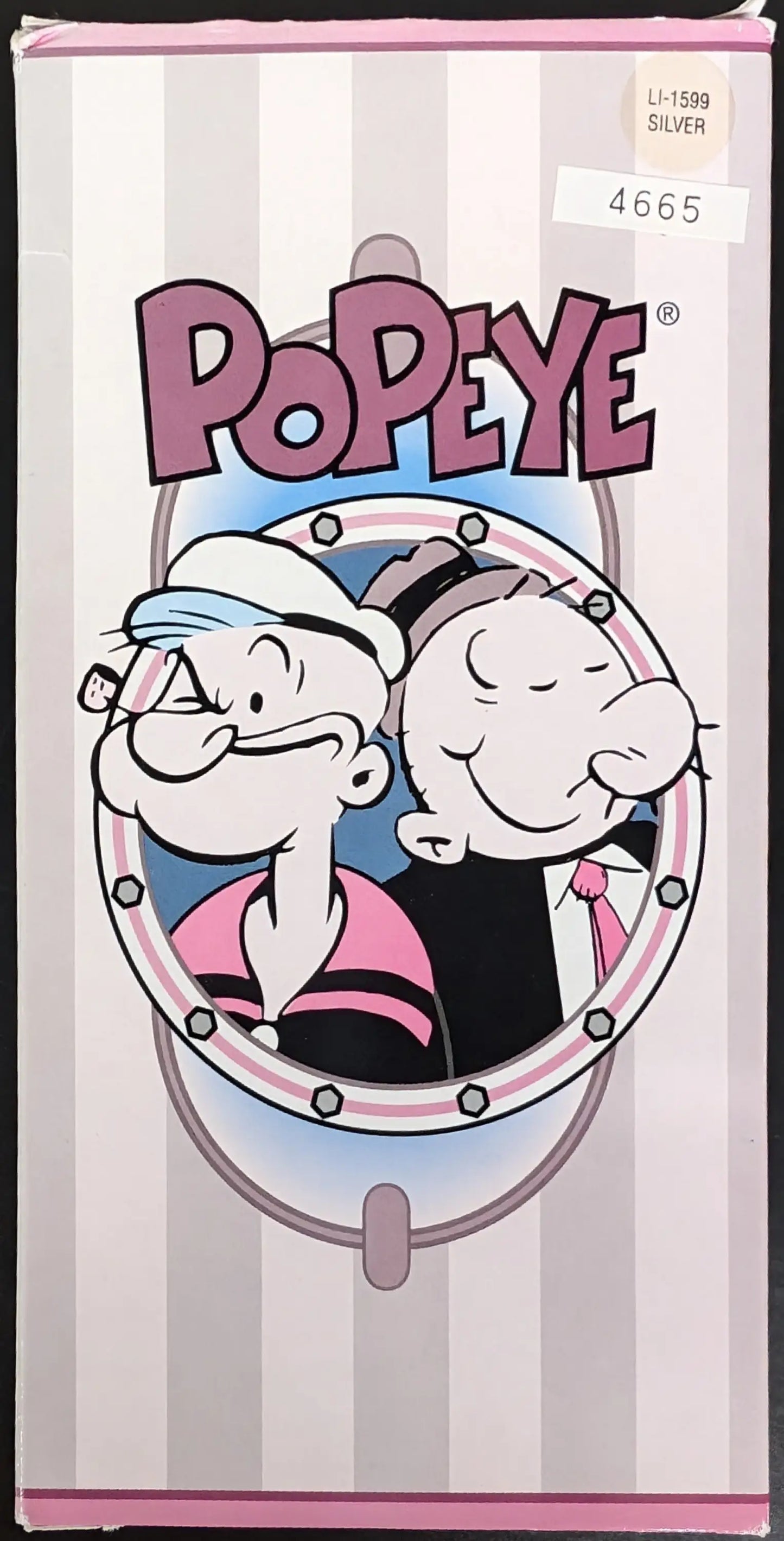 Pink and gray VHS tape case showcasing Popeye in a porthole for limited edition pocket watch