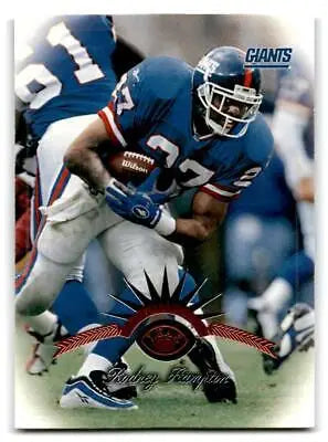 Rodney Hampton in action on a 1997 Leaf trading card showcasing his football skills