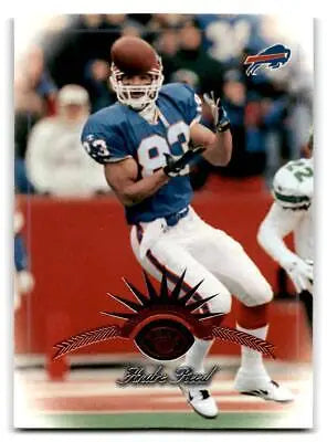 Andre Reed in action on his 1997 Leaf trading card, showcasing football excellence
