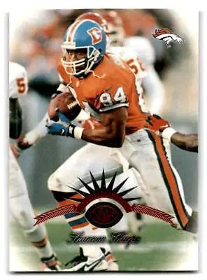 Shannon Sharpe in action on 1997 Leaf trading card showcasing football excitement