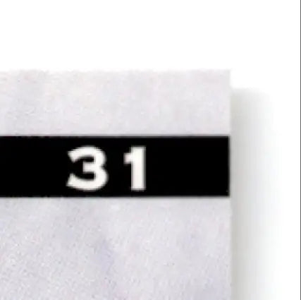 White fabric swatch with black label for Leaf Cris Carter 1997 Leaf Cris Vikings product