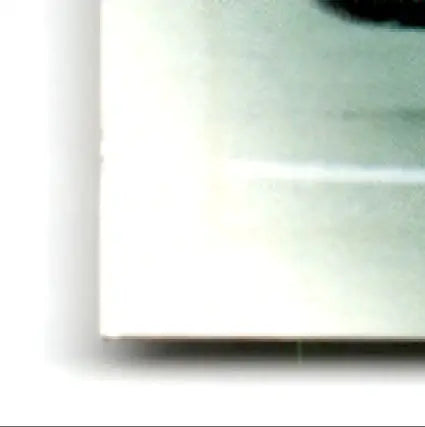 Close-up of white leaf football card featuring Charlie Garner Philadelphia Eagles