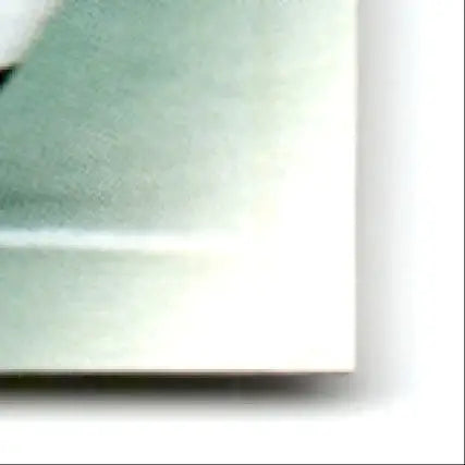 Light green rectangular leaf football canvas with white border featuring Charlie Garner