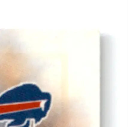 Partial view of Buffalo Bills logo on white and tan surface for Leaf Football Darick Holmes product