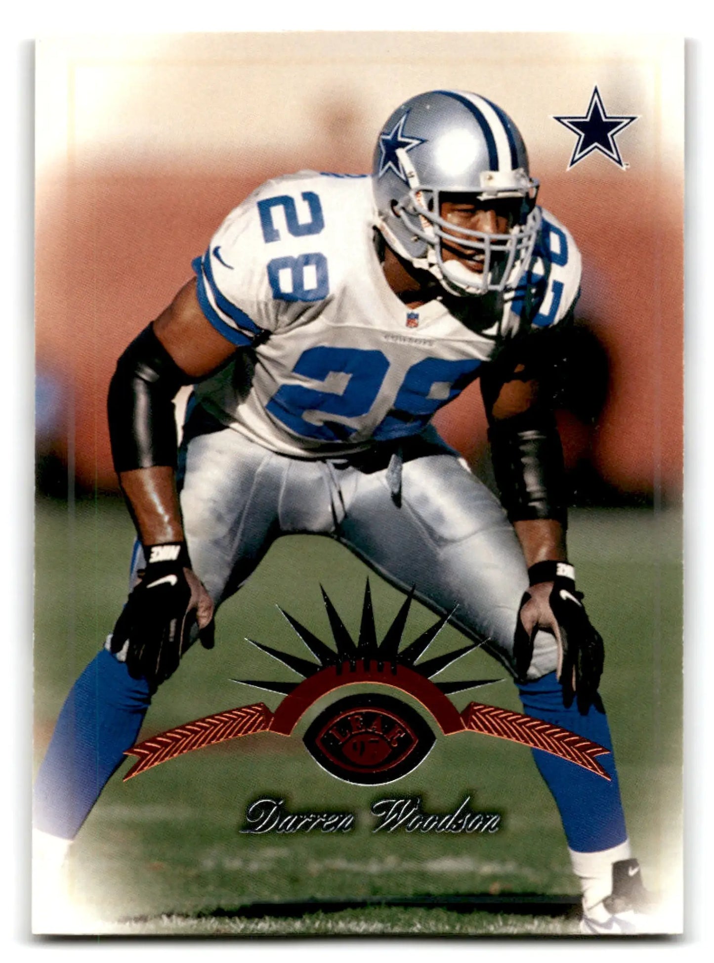 Leaf football Darren Woodson trading card featuring Darren Woodson in Dallas Cowboys uniform
