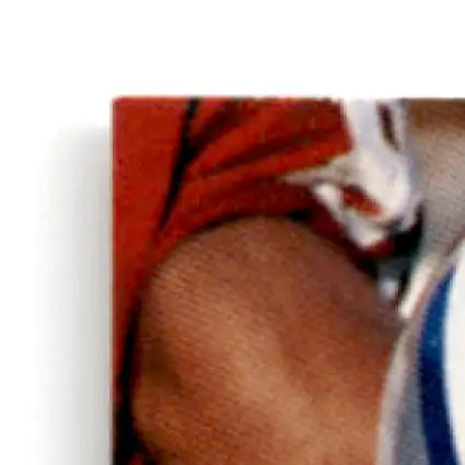 Upper torso of a person in a red and white athletic uniform for Leaf Football Darren Woodson