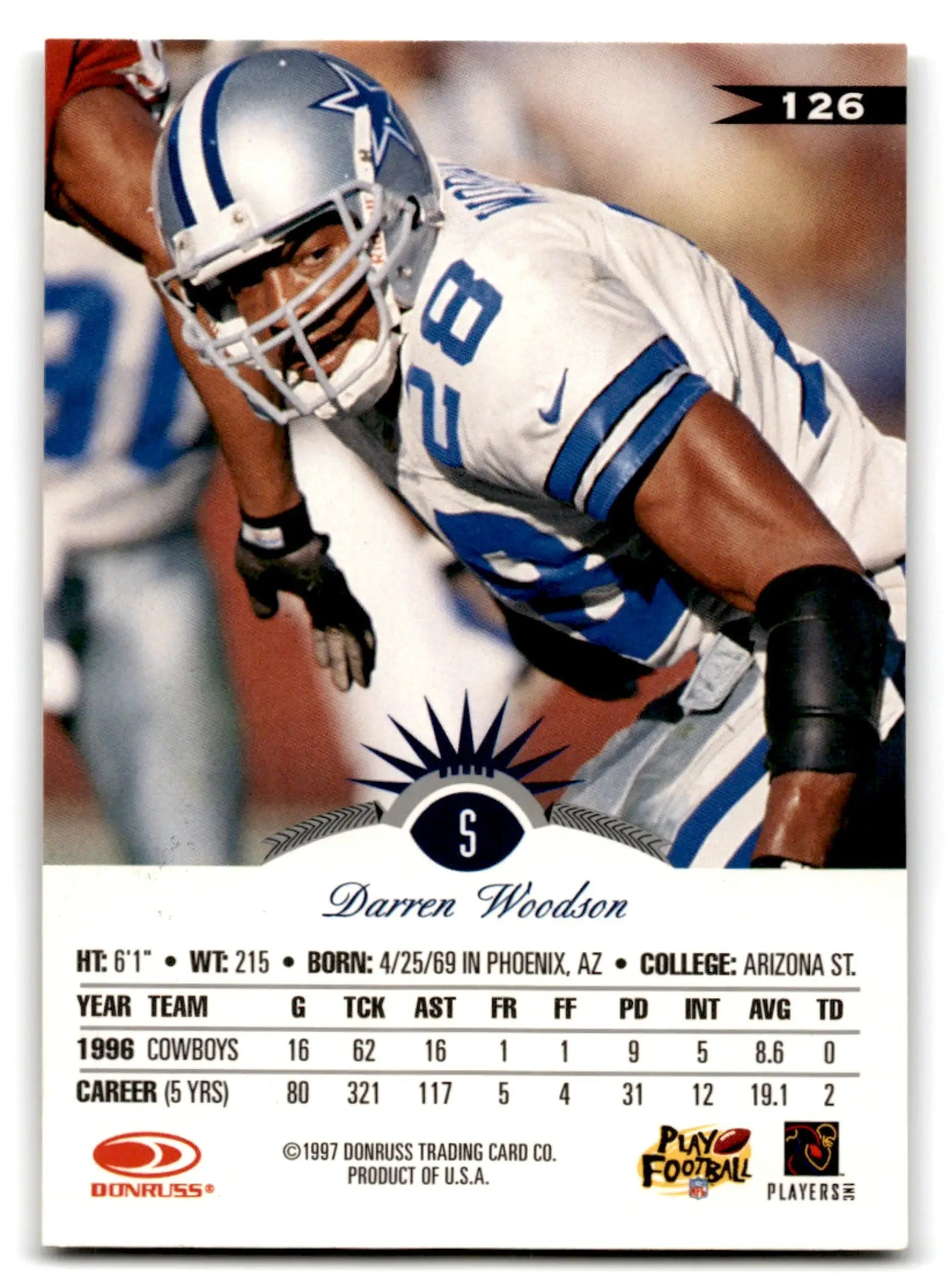 Vintage leaf football Darren Woodson trading card featuring Dallas Cowboys uniform