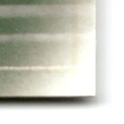 Light-colored rectangular leaf football Daryl Johnston with subtle lines for Dallas Cowboys