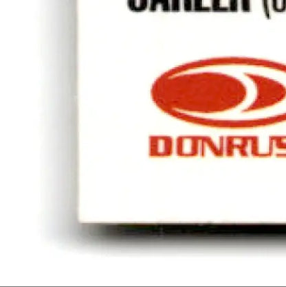 Partial view of a white Leaf Football Daryl Johnston trading card with red logo