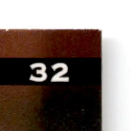 Brown leaf football Heath Shuler box with 32 on black stripe for 1997 Leaf Football Heath Shuler #32 New Orleans Saints