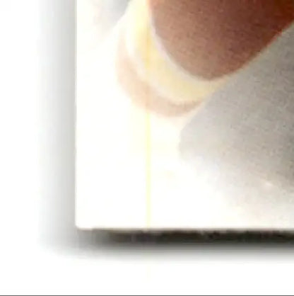 Glossy Leaf Football Neil Smith print with light vertical streak for Denver Broncos fans