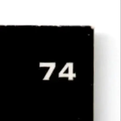 Black rectangular sign with white numbers for Leaf Football Simeon Rice Arizona Cardinals
