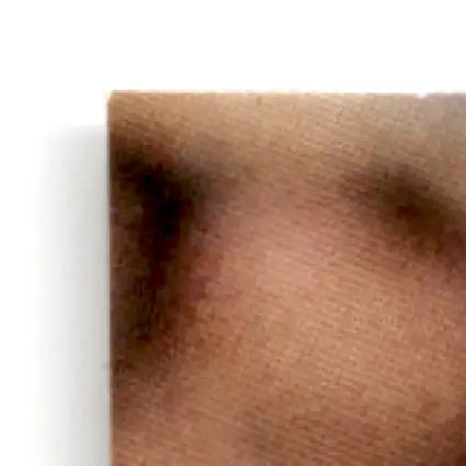 Close-up of a person’s eye with detailed skin texture, inspired by Leaf Football Tim Brown #144 Oakland Raiders