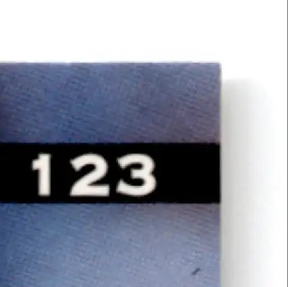 Blue book with black spine label for Leaf Football Zach Zach Thomas Miami Dolphins collectible