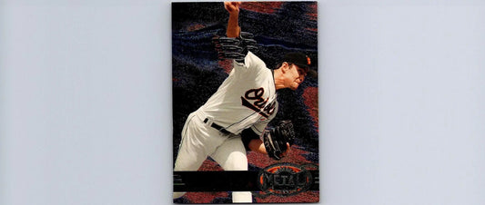Baseball card of 1997 Metal Universe #6 Mike Mussina trading card collectible