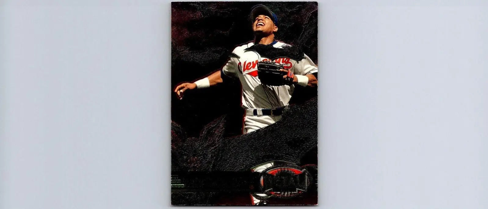 Manny Ramirez 1997 Metal Universe trading card featuring player catching a ball