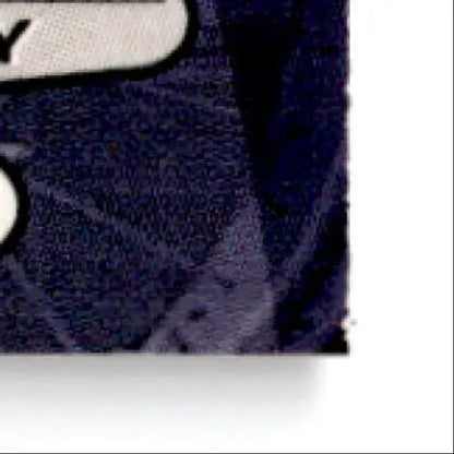 Dark blue textured plush fabric from 1997 Press Pass Racing Geoff Bodine #16 racing card