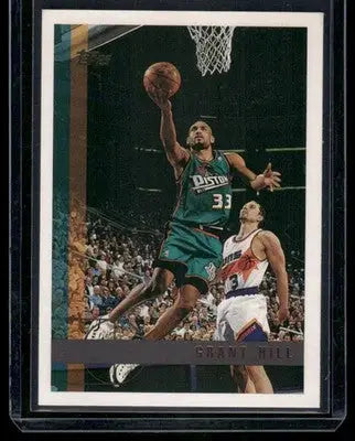 Vintage 1997 Topps Stadium Club Grant Hill basketball trading card in protective sleeve
