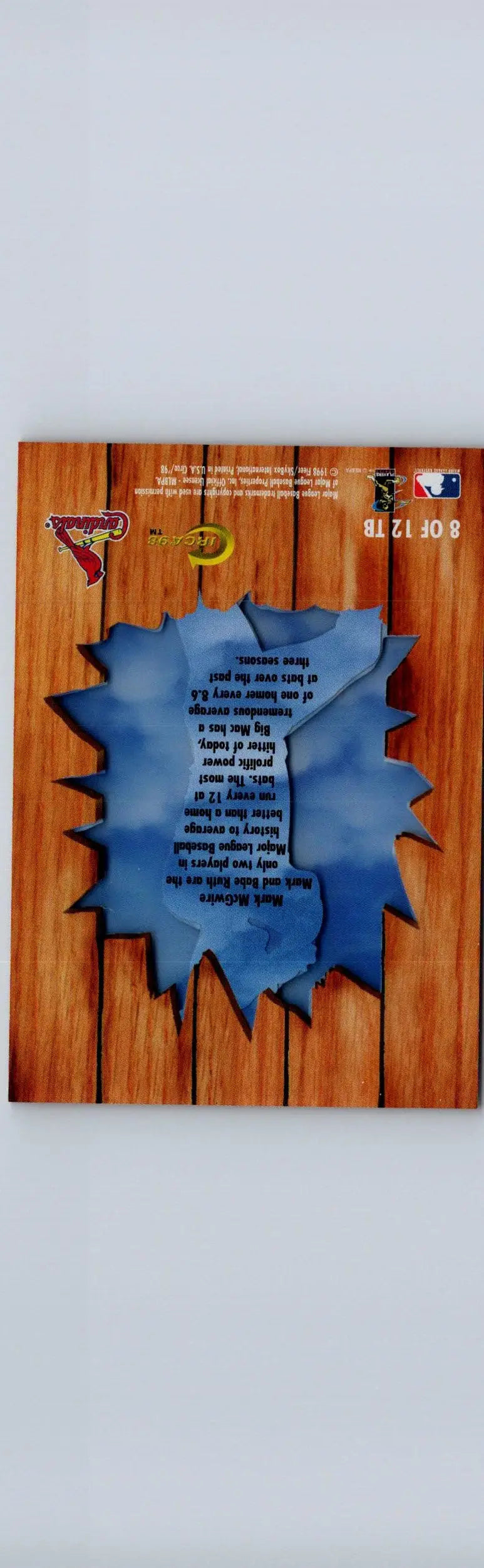 Baseball card featuring Mark McGwire Thunder with wooden panel design and blue cutout