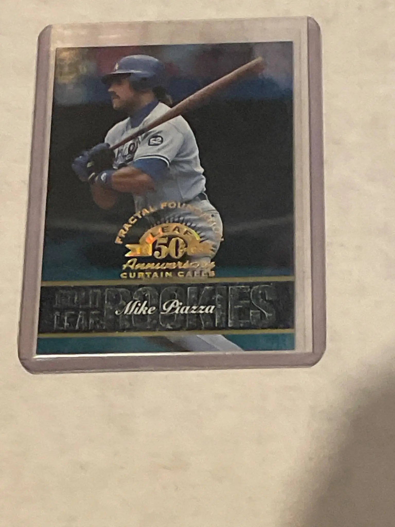 Baseball card of Mike Piazza batting from the 1998 Leaf Fractal Foundations series