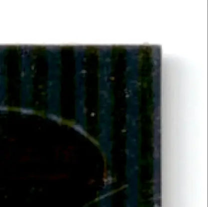 Dark striped rectangular object with curved indentation from Bowman Baseball’s Best Kevin Brown Los Angeles Dodgers card