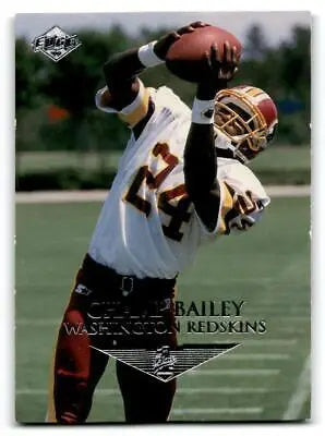 Football player catching a pass in 1999 Collector’s Edge Champ Bailey trading card