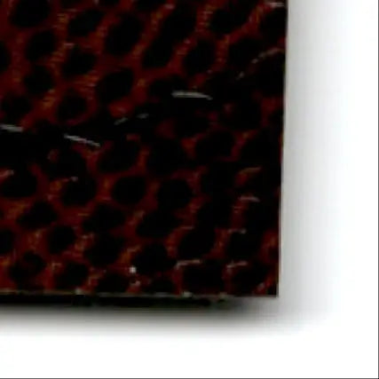 Textured brown and black patterned fabric from Upper Deck Football Ovation Steve Young card