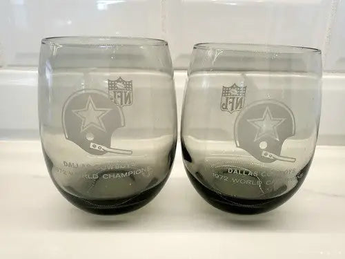 Two smoke gray Dallas Cowboys glasses celebrating 1972 NFL world champions