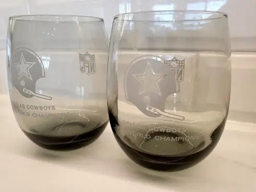Two Dallas Cowboys smoke gray glasses commemorating 1972 World Champions