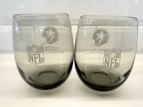 Two smoke gray NFL Dallas Cowboys glasses celebrating 1972 World Champions