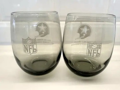 Two smoke gray NFL Dallas Cowboys glasses celebrating 1972 World Champions