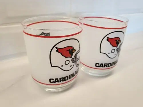 Two Vintage NFL Mobil glasses featuring the Louis Cardinals logo displayed together
