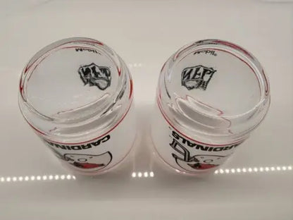 Two Arizona Cardinals glasses from Vintage NFL Mobil collection showcasing Louis Cardinals
