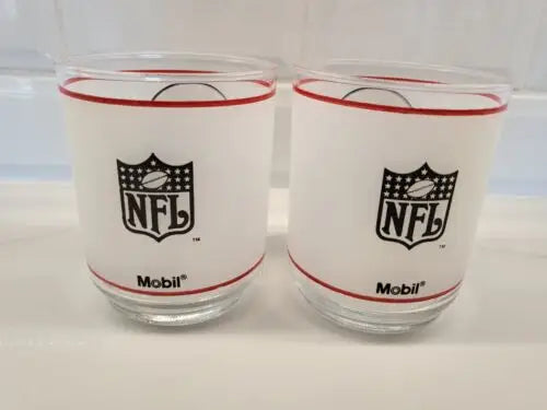 Two Vintage NFL Mobil glasses featuring the St. Louis Cardinals design