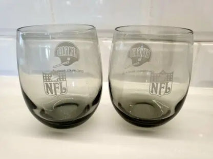 Two gray smoked glass tumblers featuring the Cincinnati Bengals logo