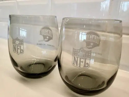 Two gray smoked glass tumblers featuring the Cincinnati Bengals logo