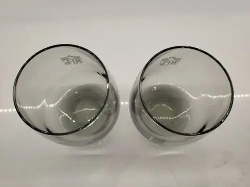 Two gray smoked glass tumblers featuring Cincinnati Bengals logo design