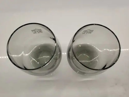 Two gray smoked glass tumblers featuring Cincinnati Bengals logo design