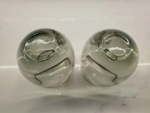 Two decorative smoked glass spheres from Cincinnati Bengals tumblers set