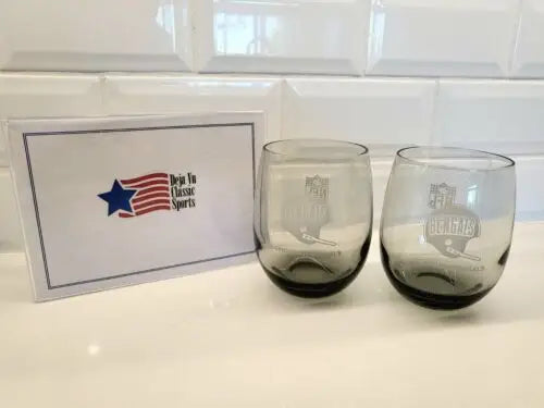 Two gray smoked glass tumblers featuring the Cincinnati Bengals logo