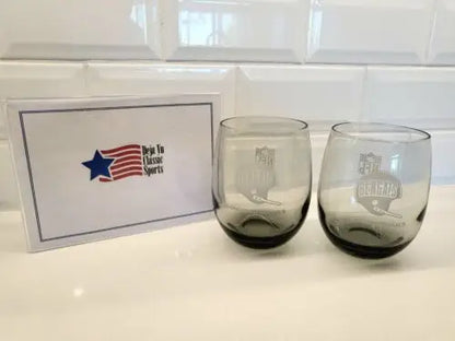 Two gray smoked glass tumblers featuring the Cincinnati Bengals logo