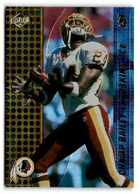 Football player in action featuring Champ Bailey on 2000 Collector’s Edge trading card