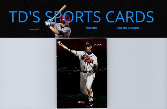 2000 Fleer Mystique #87 Chipper Jones trading card featuring vibrant design and stats