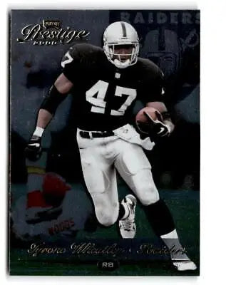 Tyrone Wheatley 2000 Playoff Prestige trading card, featuring a vibrant design and stats